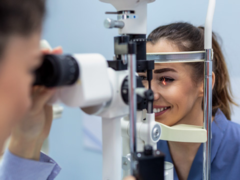 Woman receiving vision exam