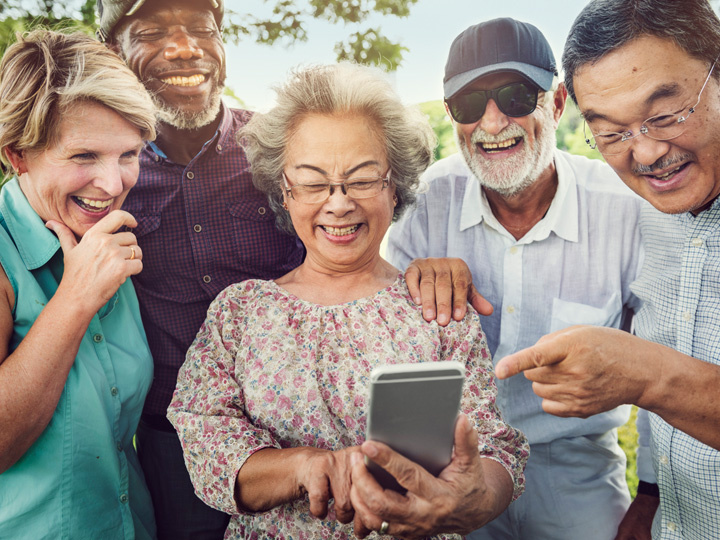 Group of seniors learning technology