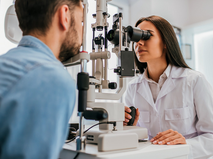 Client receiving annual vision exam