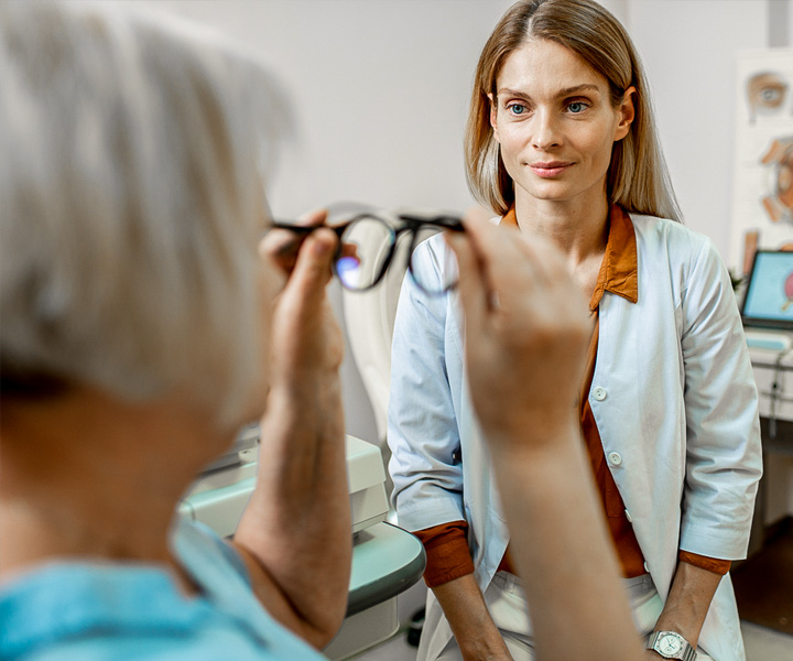 Woman gets vision exam at VisAbility's Primary Vision Center