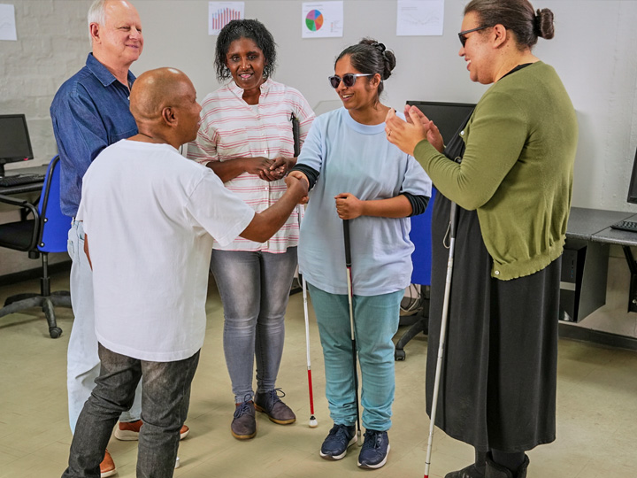 A lively meeting of a visually impaired support group